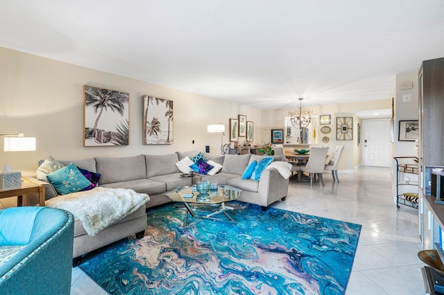 living room featuring a notable chandelier