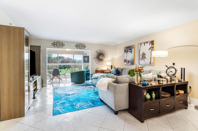 living room with light tile patterned floors