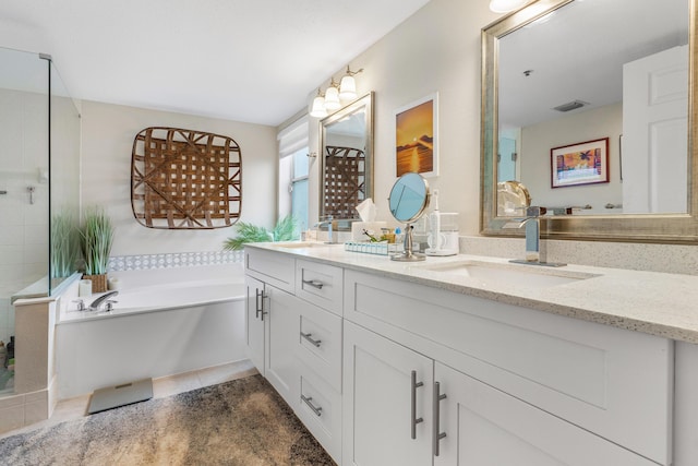 bathroom with vanity, separate shower and tub, and tile patterned flooring