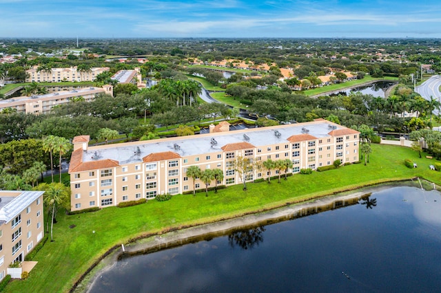 drone / aerial view with a water view