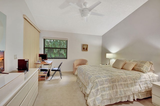 carpeted bedroom with ceiling fan, a textured ceiling, and lofted ceiling