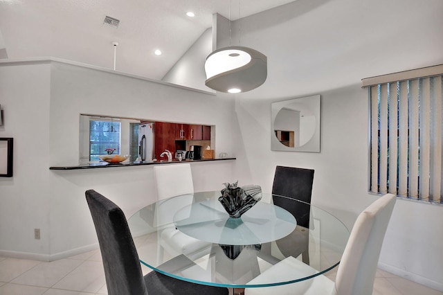 dining area with light tile patterned floors