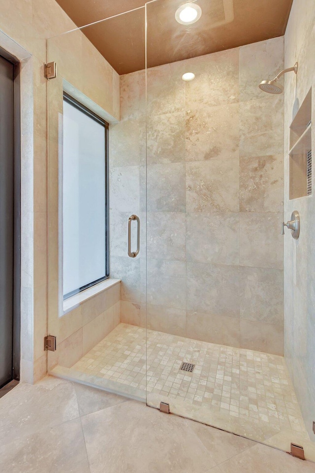 bathroom with an enclosed shower