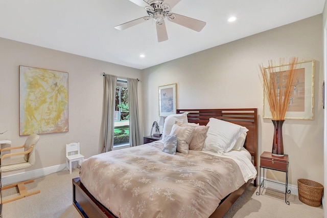 bedroom featuring ceiling fan and light colored carpet