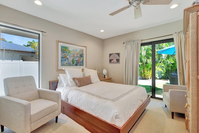 carpeted bedroom with access to outside and ceiling fan