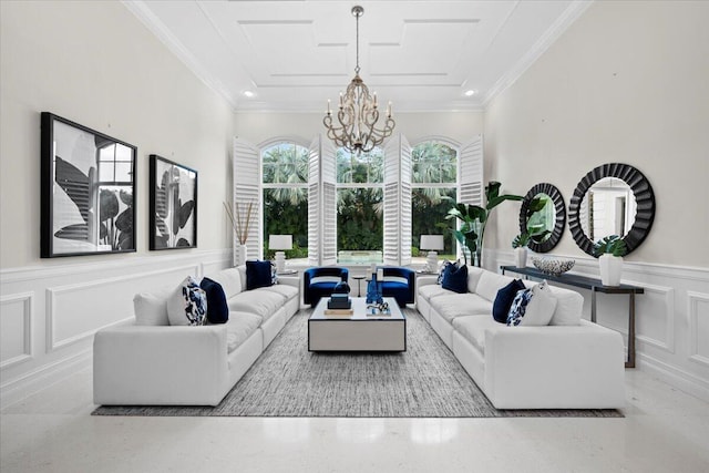 living room with crown molding and a chandelier