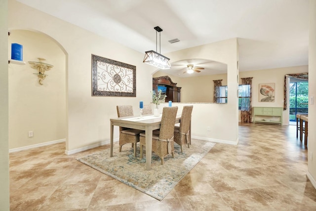 dining area with ceiling fan