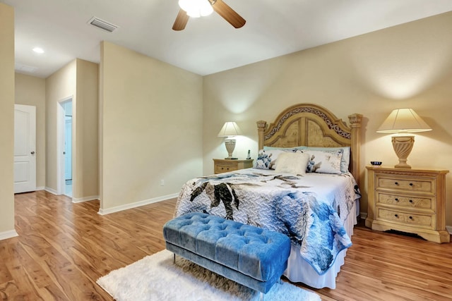 bedroom featuring ceiling fan and light hardwood / wood-style floors