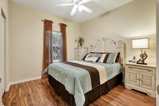 bedroom featuring light hardwood / wood-style floors and ceiling fan