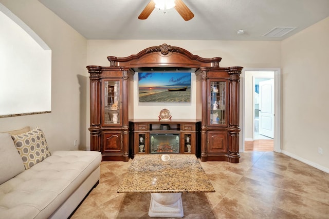 living room with ceiling fan