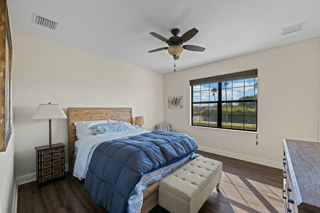 bedroom featuring dark hardwood / wood-style floors and ceiling fan