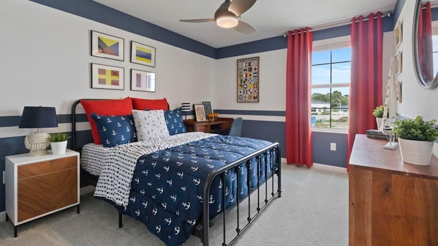 bedroom with carpet and baseboards