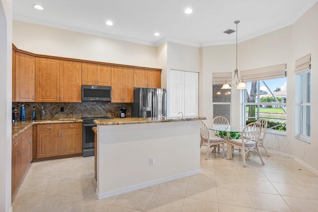 kitchen with crown molding, tasteful backsplash, light tile patterned floors, a center island, and stainless steel appliances