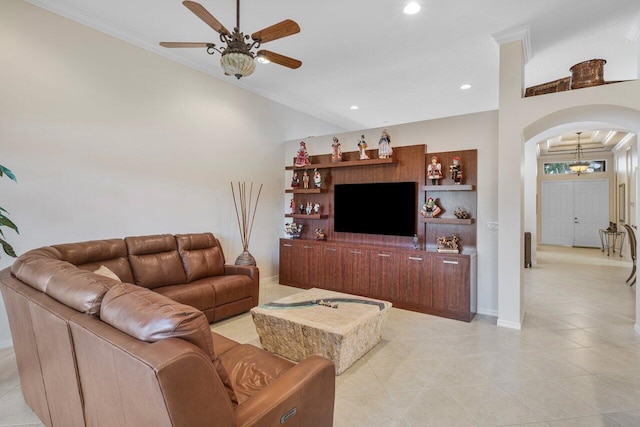 living room with ceiling fan, ornamental molding, and light tile patterned flooring