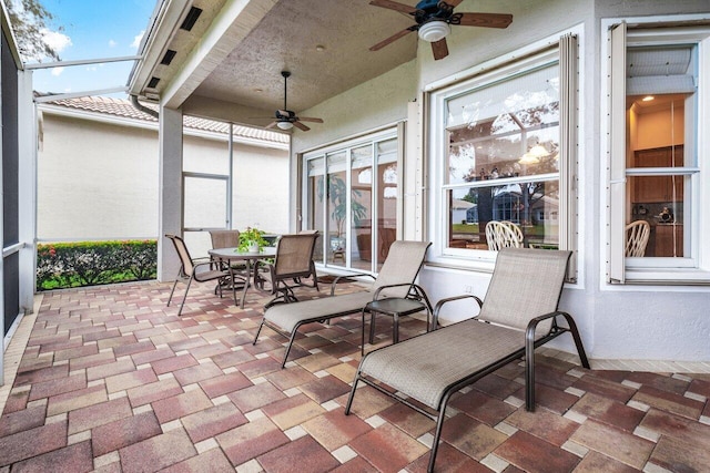 view of patio with ceiling fan