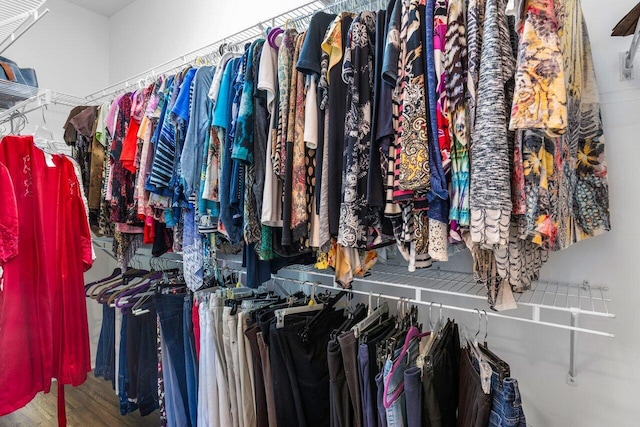 spacious closet featuring hardwood / wood-style floors