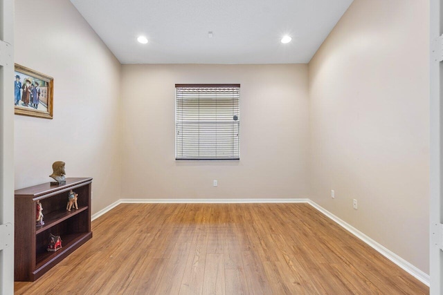 unfurnished room featuring light wood-type flooring