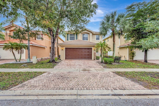 view of front of home with a garage