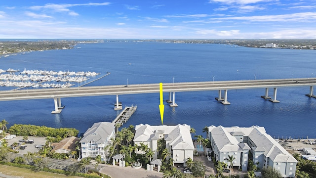 birds eye view of property featuring a water view