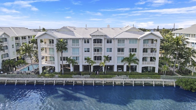 view of building exterior featuring a water view