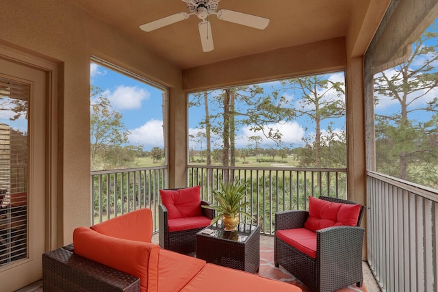 sunroom / solarium with ceiling fan