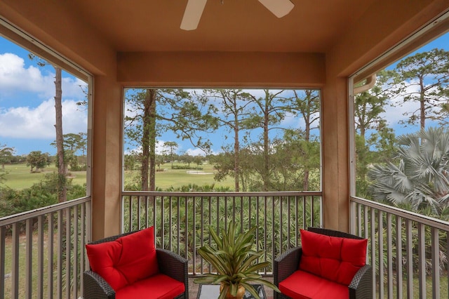 sunroom / solarium with ceiling fan