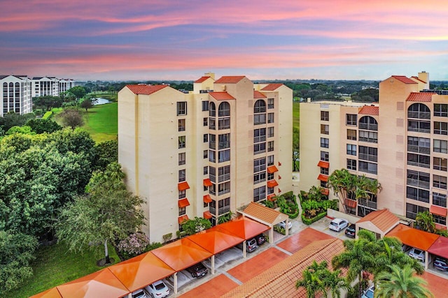 view of outdoor building at dusk