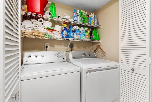 laundry area with separate washer and dryer