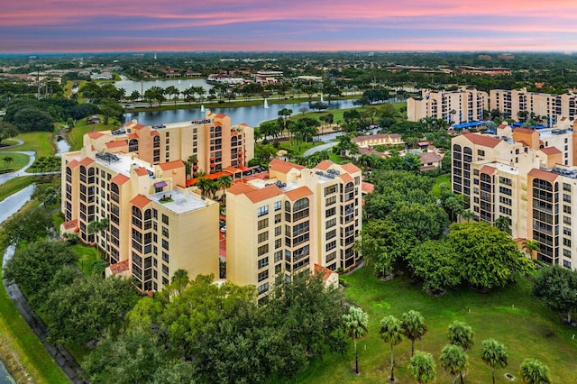 bird's eye view with a water view