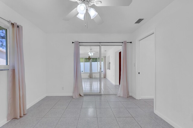 living room with french doors, ceiling fan, crown molding, and light wood-type flooring