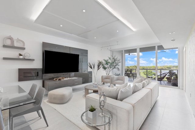 living area with recessed lighting and expansive windows