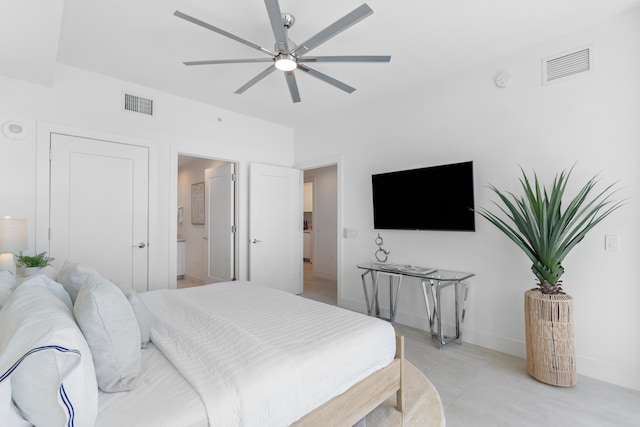 bedroom with ensuite bathroom, ceiling fan, visible vents, and baseboards