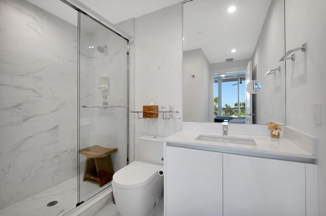 full bathroom featuring a marble finish shower, visible vents, toilet, vanity, and recessed lighting