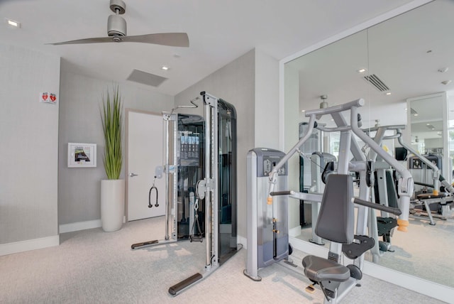 gym featuring ceiling fan, carpet floors, visible vents, and baseboards