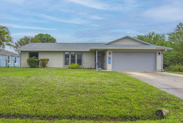 single story home featuring a front yard and a garage