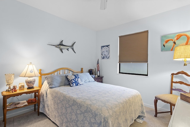 bedroom featuring ceiling fan and carpet flooring