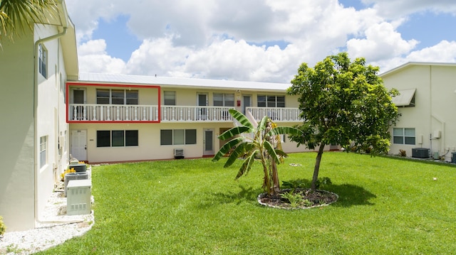 exterior space featuring a balcony and central AC