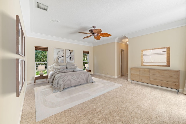 bedroom featuring multiple windows, crown molding, light carpet, and a textured ceiling