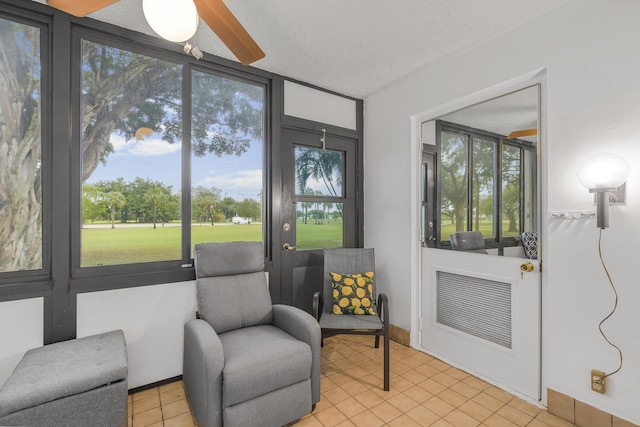 sunroom featuring heating unit