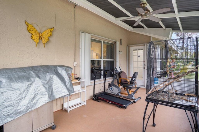 view of patio featuring ceiling fan