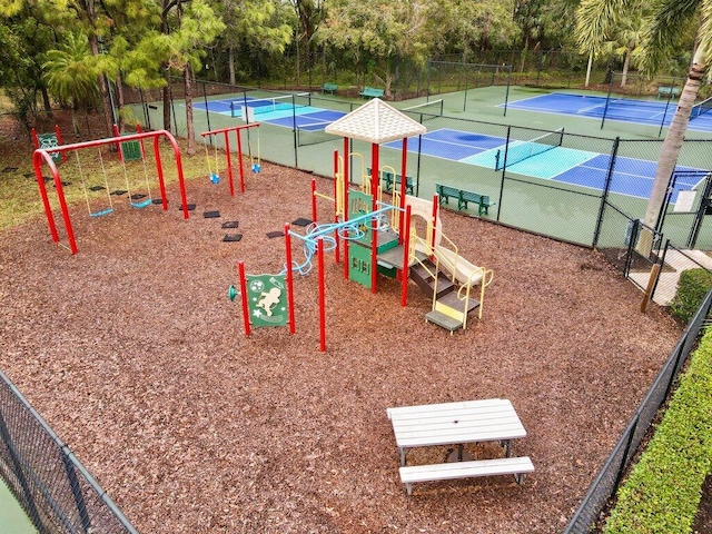 view of play area featuring tennis court