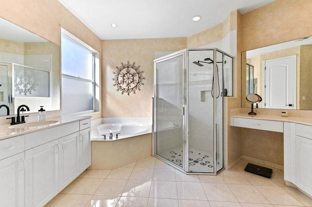 bathroom with vanity, tile patterned floors, and separate shower and tub