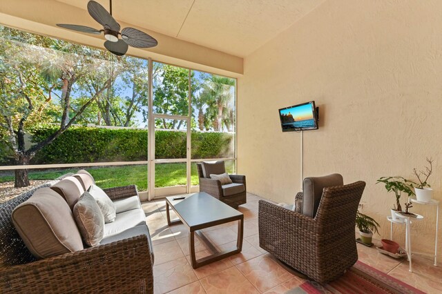 sunroom / solarium with ceiling fan