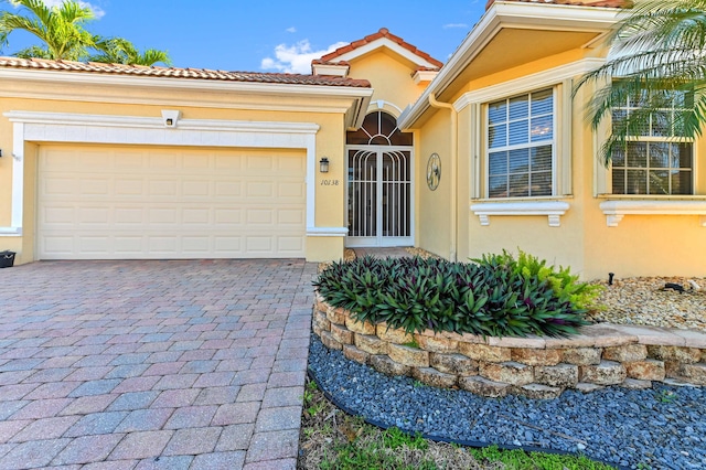 view of front of property with a garage