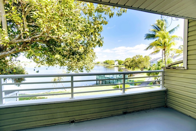 balcony featuring a water view