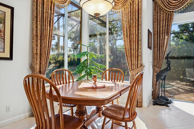 dining space with tile patterned floors