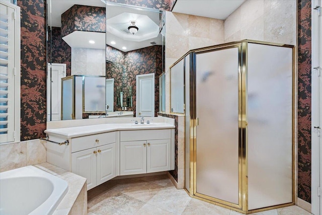 bathroom with vanity and plus walk in shower