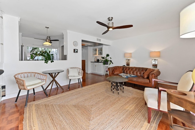 living room featuring ceiling fan