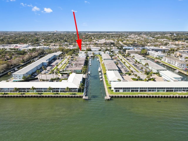 birds eye view of property featuring a water view