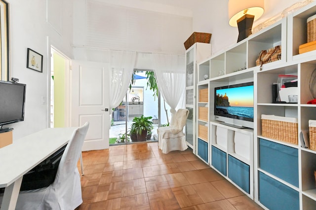 118 Castlewood Dr Unit 128, North Palm Beach, FL 33408 - home office featuring a high ceiling